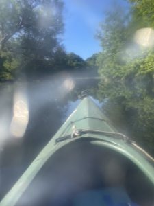 Blurry Kayaking photo on the river taken by author